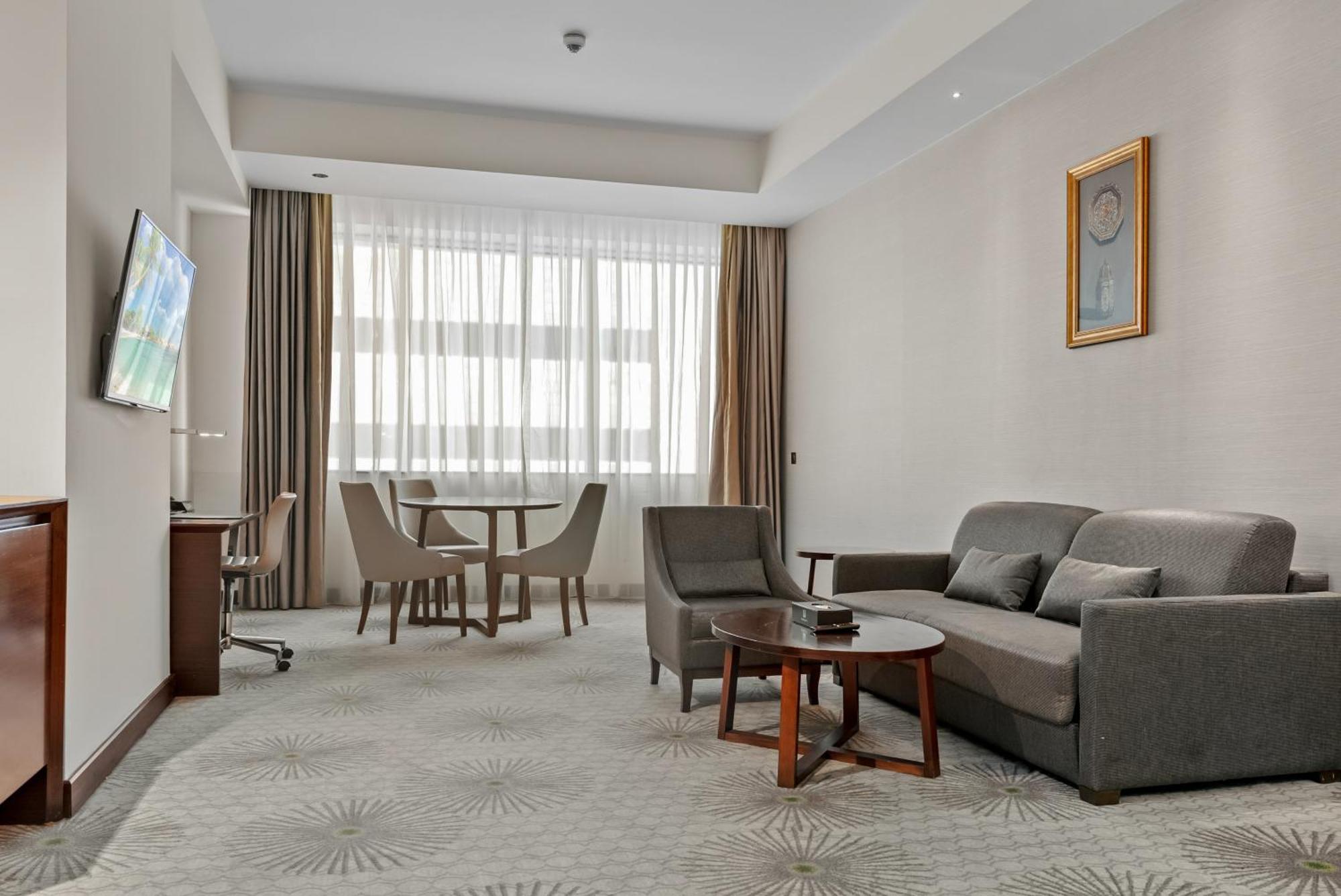 Holiday Suites Al Aziziah La Meca Exterior foto A room at the hotel