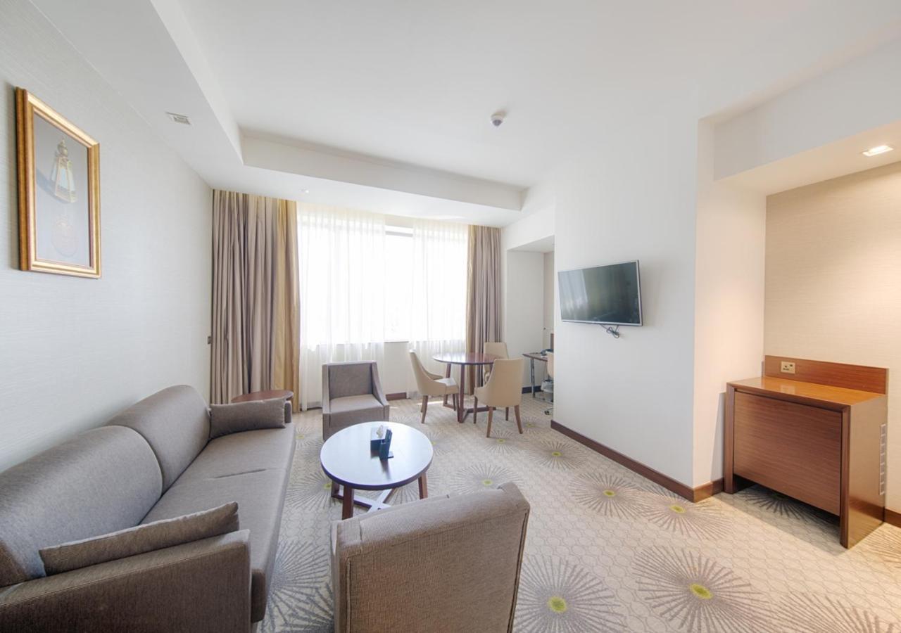 Holiday Suites Al Aziziah La Meca Exterior foto A room at the hotel
