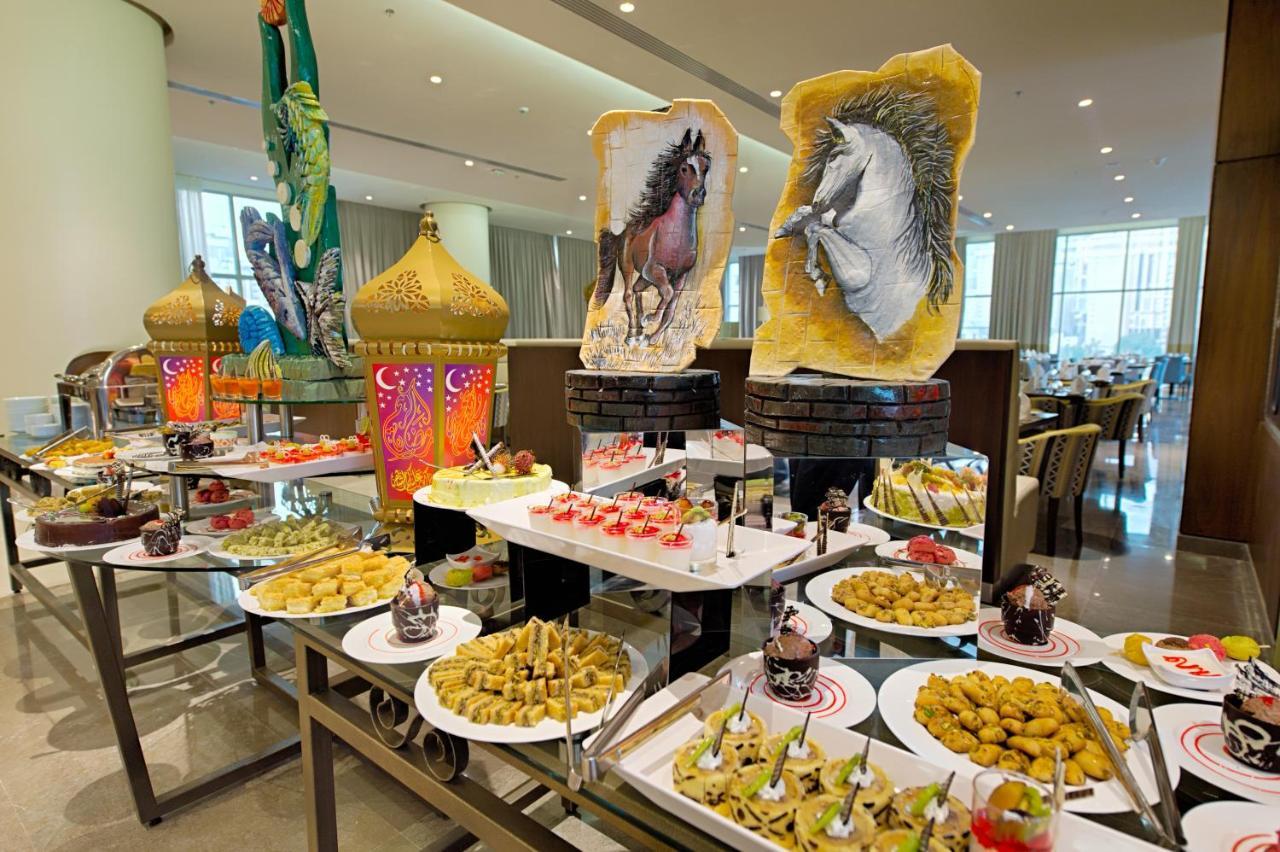 Holiday Suites Al Aziziah La Meca Exterior foto A buffet at the Jumeirah Jumeirah Hotel