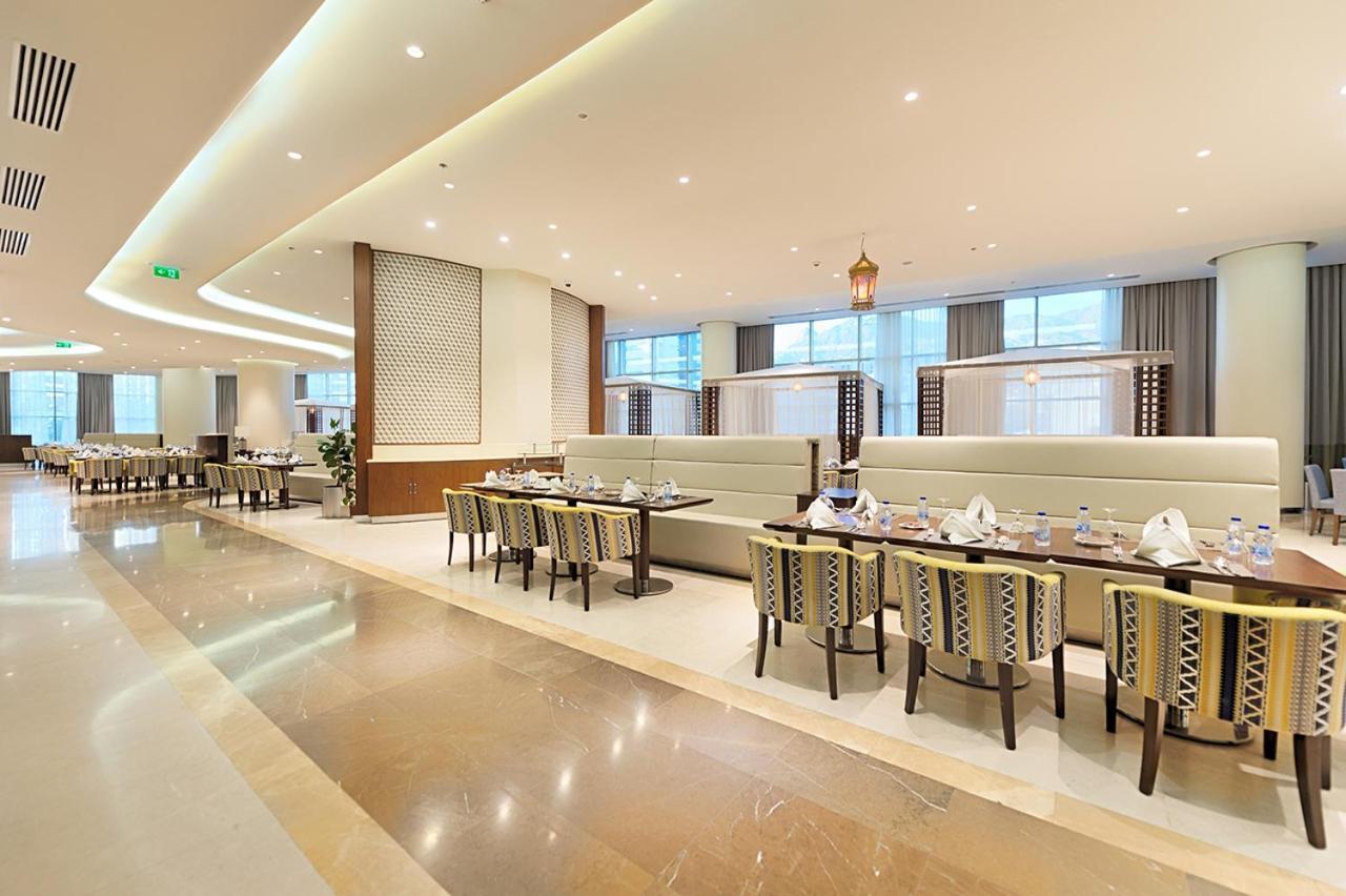 Holiday Suites Al Aziziah La Meca Exterior foto The hotel's restaurant
