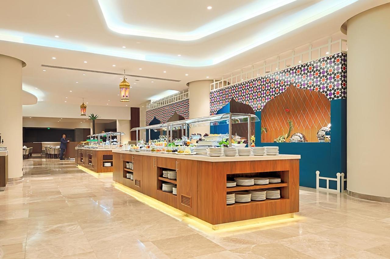 Holiday Suites Al Aziziah La Meca Exterior foto The hotel's restaurant