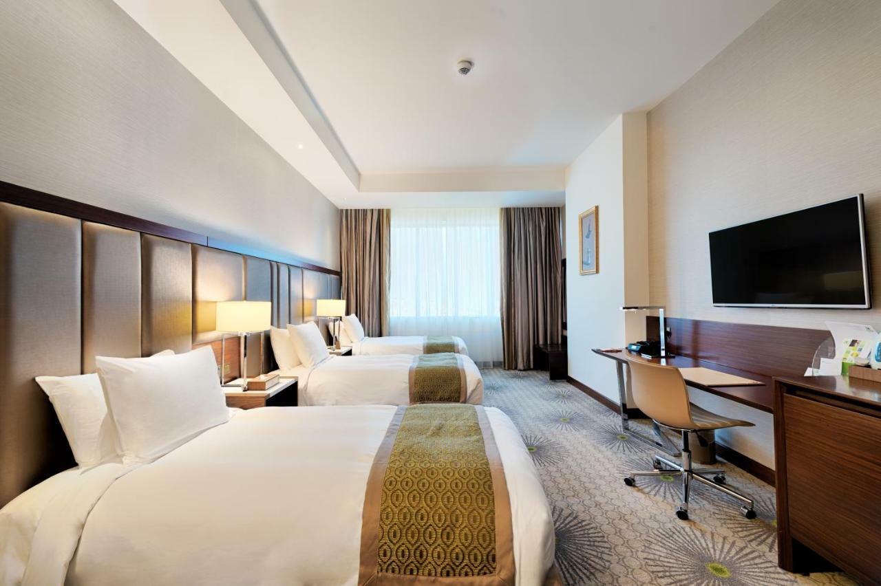Holiday Suites Al Aziziah La Meca Exterior foto A room at the hotel